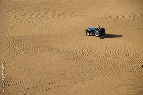 Fototapeta Naklejka Na Ścianę i Meble -  tractor on the sand