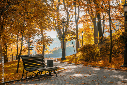 Bench in the beautiful autumn park.