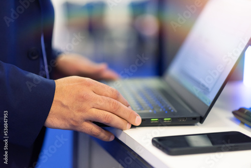 Business people hands using laptop computer during conference