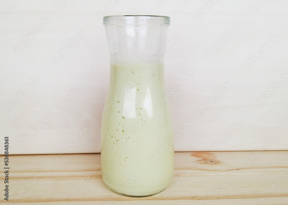 Brazilian avocado smoothie on a wooden background Brazilian avocado smoothie on a wooden background
