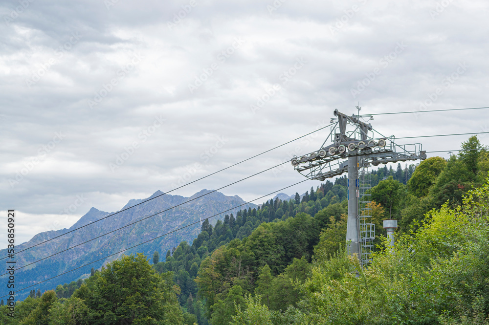 lifts of the mountain cable car on the background of mountains