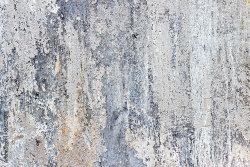 Old painted wall with scratches and cracks, grunge background © svetlanais
