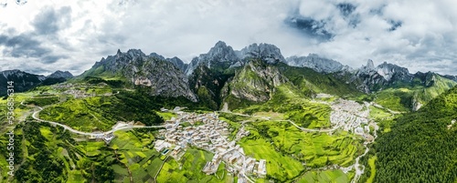 Aerial panorama of Gannan Tibetan Autonomous Prefecture in Gansu Province, China with cloudy sky photo