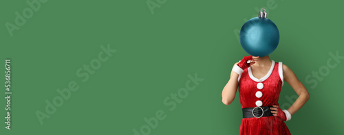 Young woman in Santa Claus ...