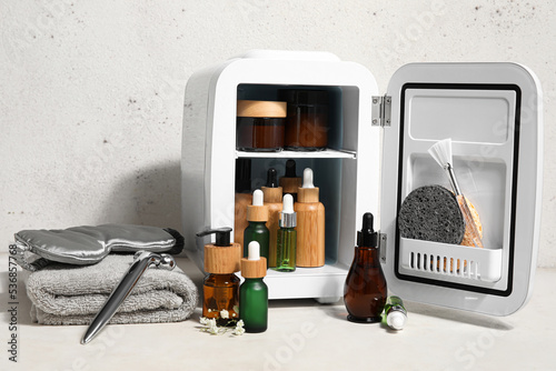 White mini fridge with skin...