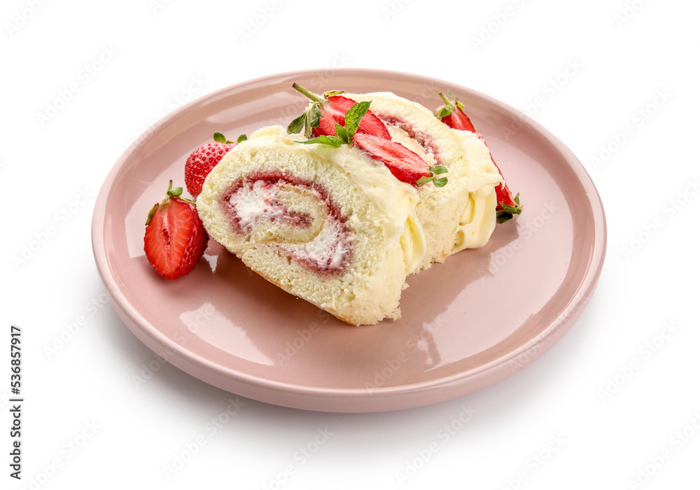 Plate with slices of delicious strawberry roll cake on white background