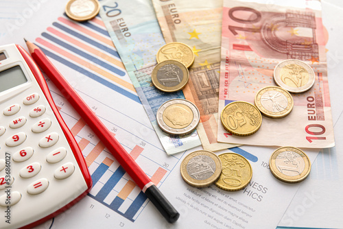 Euro banknotes with coins, ...