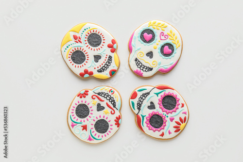 Skull shaped cookies on white background. El Dia de Muertos