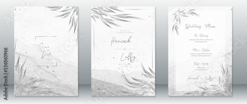 Elegant wedding invitation card template with nature leaf and watercolor gray background