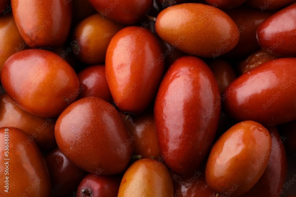 Heap of ripe red dates as background, closeup Heap of ripe red dates as background, closeup