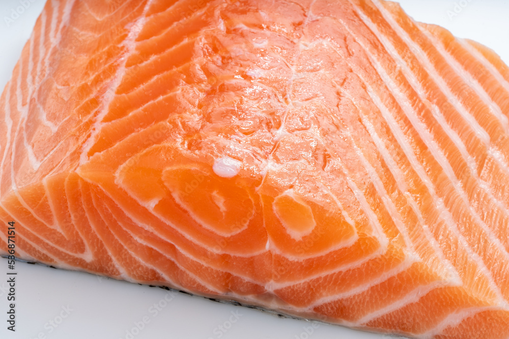 Close up view fresh Salmon fish fillet, Natural Atlantic Norwegian Salmon Fillet Texture. Close up view fresh Salmon fish fillet, Natural Atlantic Norwegian Salmon Fillet Texture.