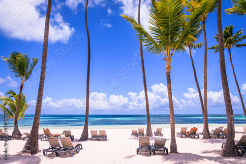 Fototapeta Naklejka Na Ścianę i Meble -  Tropical idyllic caribbean beach with palm trees, Punta Cana, Dominican Republic