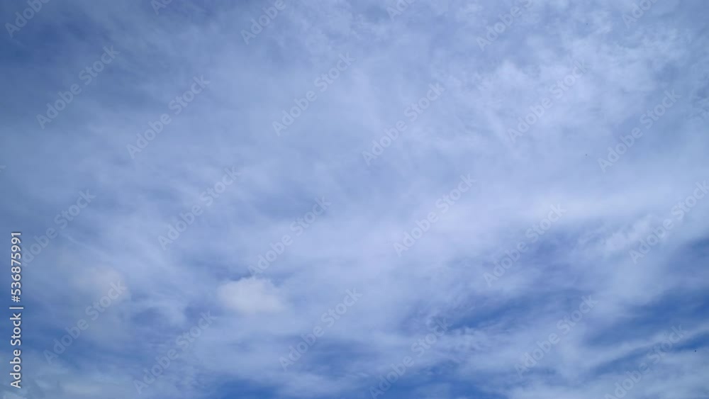 Blue sky with fluffy cloud time lapse on a sunny day 4k footage. Blue sky with fluffy cloud time lapse on a sunny day 4k footage.