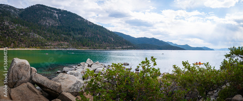 Tranquil Lake Tahoe with glacial rocks and boulders in Sand Harbor in Nevada