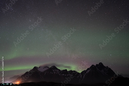 aurora borealis over mountain © Yusuke