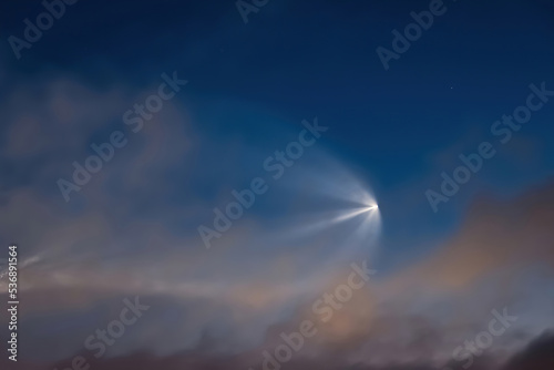 Soyuz space rocket launch. Space jellyfish in sky. Plume of rocket gases in sun at dawn. photo