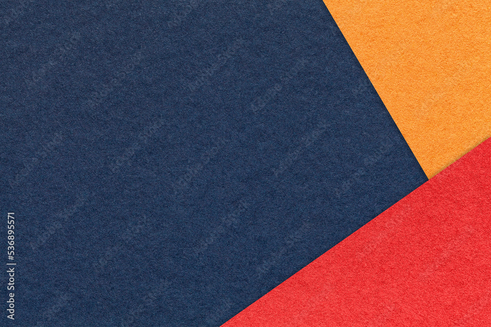 Craft navy blue color paper background with red and orange border. Vintage denim cardboard. Presentation template Craft navy blue color paper background with red and orange border. Vintage denim cardboard. Presentation template