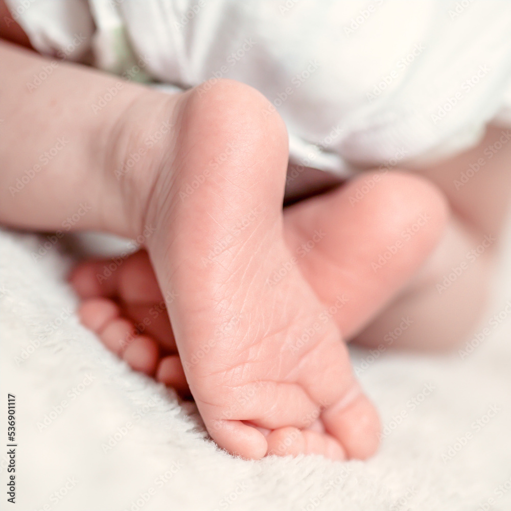 Sleeping adorable baby foot in bed Sleeping adorable baby foot in bed