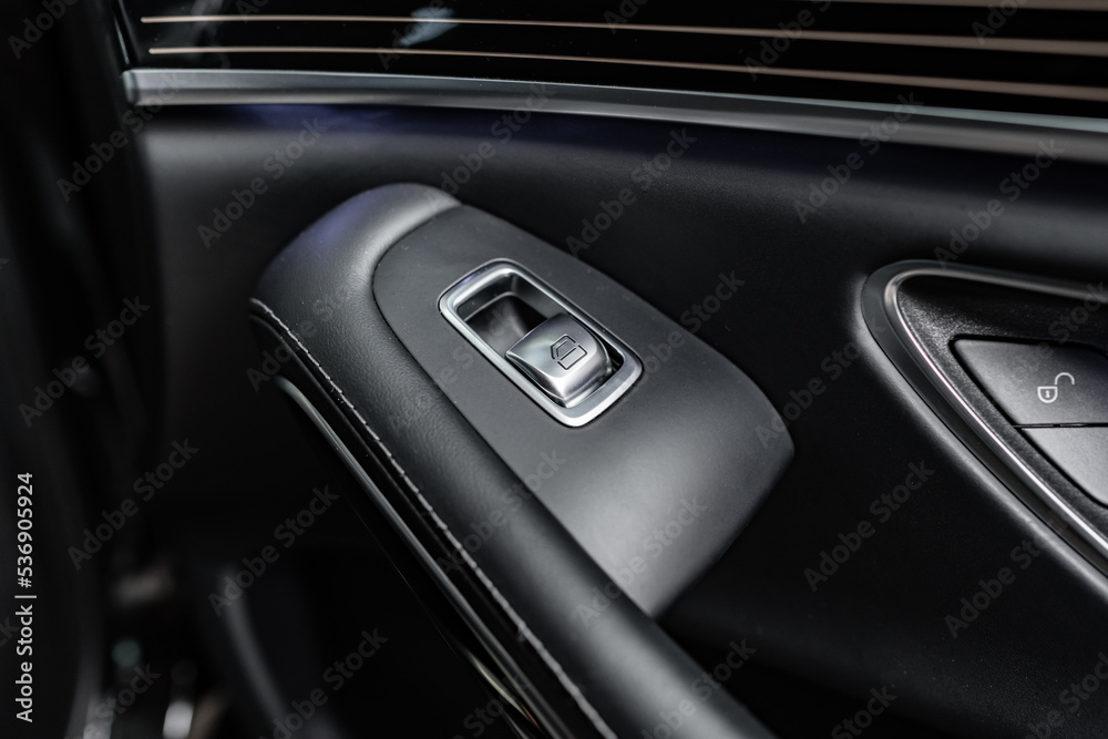 Car door inside the luxury modern car close up