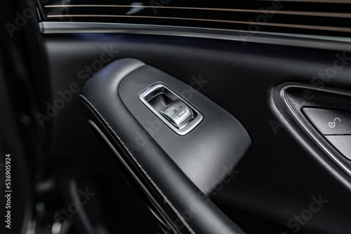 Car door inside the luxury modern car close up