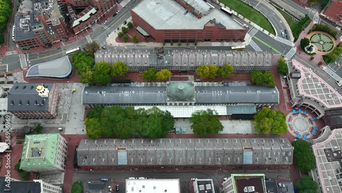 Faneuil Hall and Quincy Market. North South Marketplace buildings in downtown Boston. Aeerial top down truck shot. Famous Freedom Trail buildings and tourist attractions in Boston Massachusetts. photo