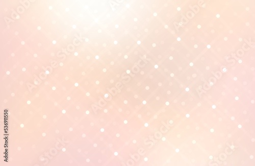 Twinkles glare on light pink shiny pearlescent background. Sparkling festive decorative stainles texture. photo