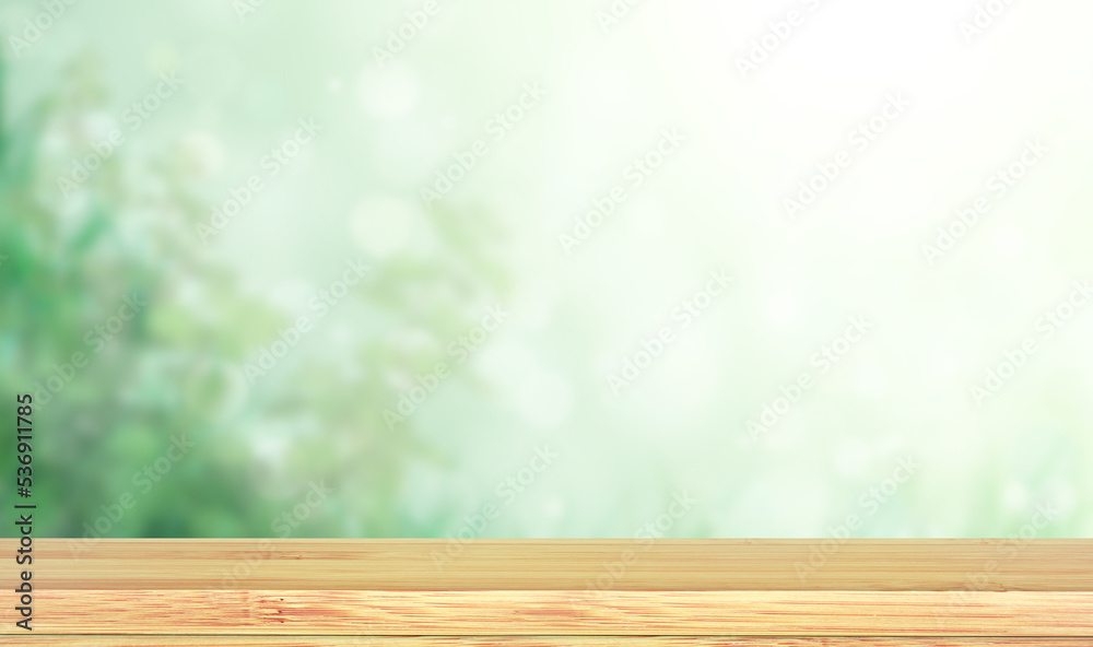 Old wooden table and abstract green background. Empty wooden table top on blurred backdrop. Rustic wooden board on nature background. Product display template