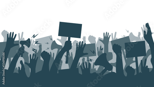 crowd of people holding a banner