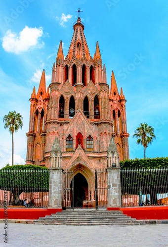 Vertical shot of the facade of Parroquia de San Miguel Arcangel Catholic church in Mexico photo