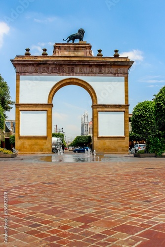 Vertical shot of Arco de La Calzada monument in Leon, Mexico photo