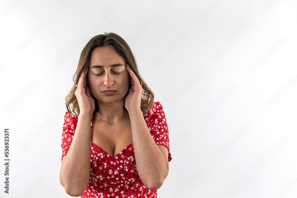 Young girl suffering from headache holding head with hands isolated over white background. Young girl suffering from headache holding head with hands isolated over white background.