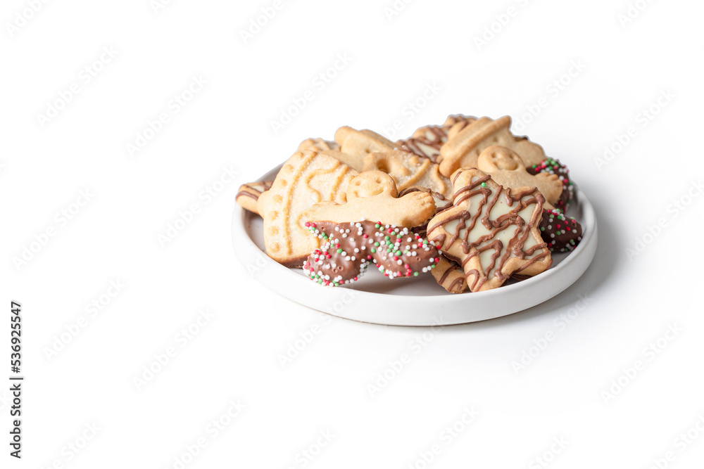 Different shape Christmas cookies into the box on white isolated background. Copy space Different shape Christmas cookies into the box on white isolated background. Copy space