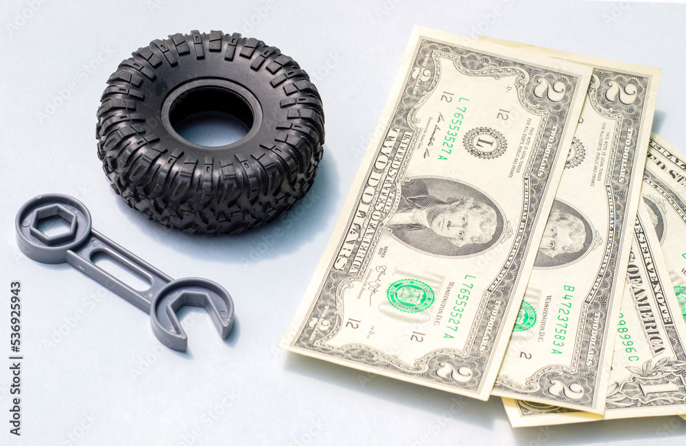 winter rubber black tire toy car wrench plastic key and one two dollar