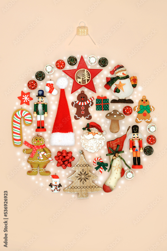 Natural abstract Christmas tree bauble decoration concept with traditional food, symbols, ornaments and decorations of metal and wood and snowflakes. Festive round shape composition.