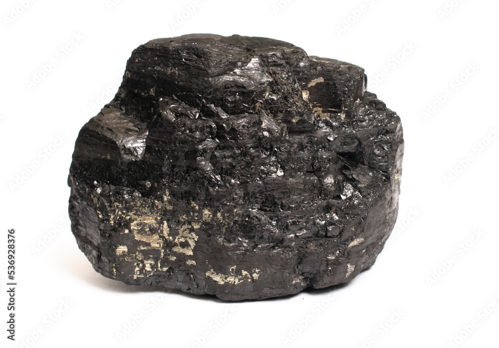 lump of hard coal on a white background with pyrite lump of hard coal on a white background with pyrite