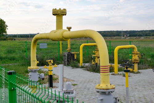 gas pipeline, natural gas installation, yellow pipes and valves, high gas prices