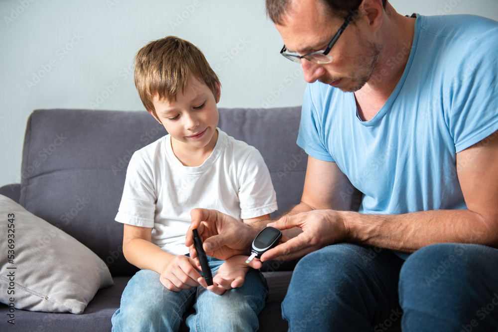 Concept children diabetes children with glucometer learning to check ...