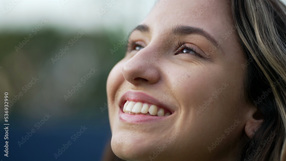 Young hispanic woman closing eyes in meditation. Millennial 20s girl opening eyes smiling. Closeup female person face Young hispanic woman closing eyes in meditation. Millennial 20s girl opening eyes smiling. Closeup female person face
