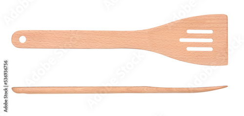 Wooden slotted spatula front and side view isolated on white background. New clean kitchen turner. photo