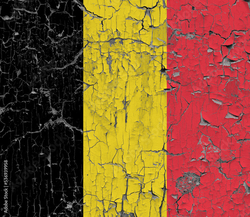 3D Flag of Belgium on an old stone wall background. © dsom