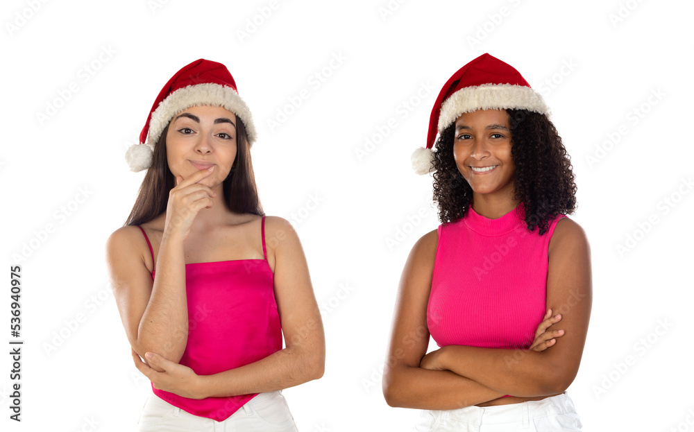 Teenager girls friend in Christmas hat isolated on white background Teenager girls friend in Christmas hat isolated on white background