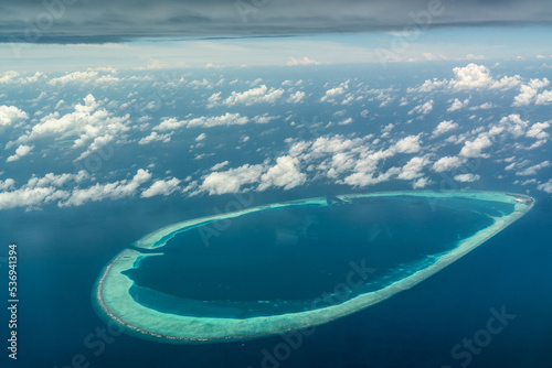 aerial view of Gaafaru - Atoll in Indien Ocean with light cloudy sky 