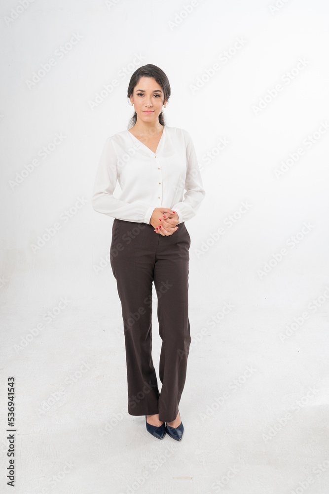 Studio portrait photo of a young beautiful elegant Brazilian female businesswoman lady wearing smart casual business attire posing with a series moments of emotion and gesture for all application Studio portrait photo of a young beautiful elegant Brazilian female businesswoman lady wearing smart casual business attire posing with a series moments of emotion and gesture for all application