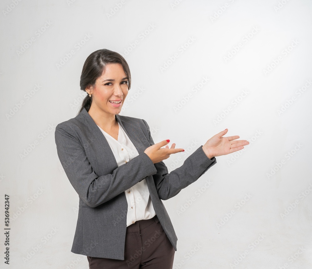 Studio portrait photo of a young beautiful elegant Brazilian female businesswoman lady wearing smart casual business attire suit posing with a series moments of emotion and gesture for all application Studio portrait photo of a young beautiful elegant Brazilian female businesswoman lady wearing smart casual business attire suit posing with a series moments of emotion and gesture for all application