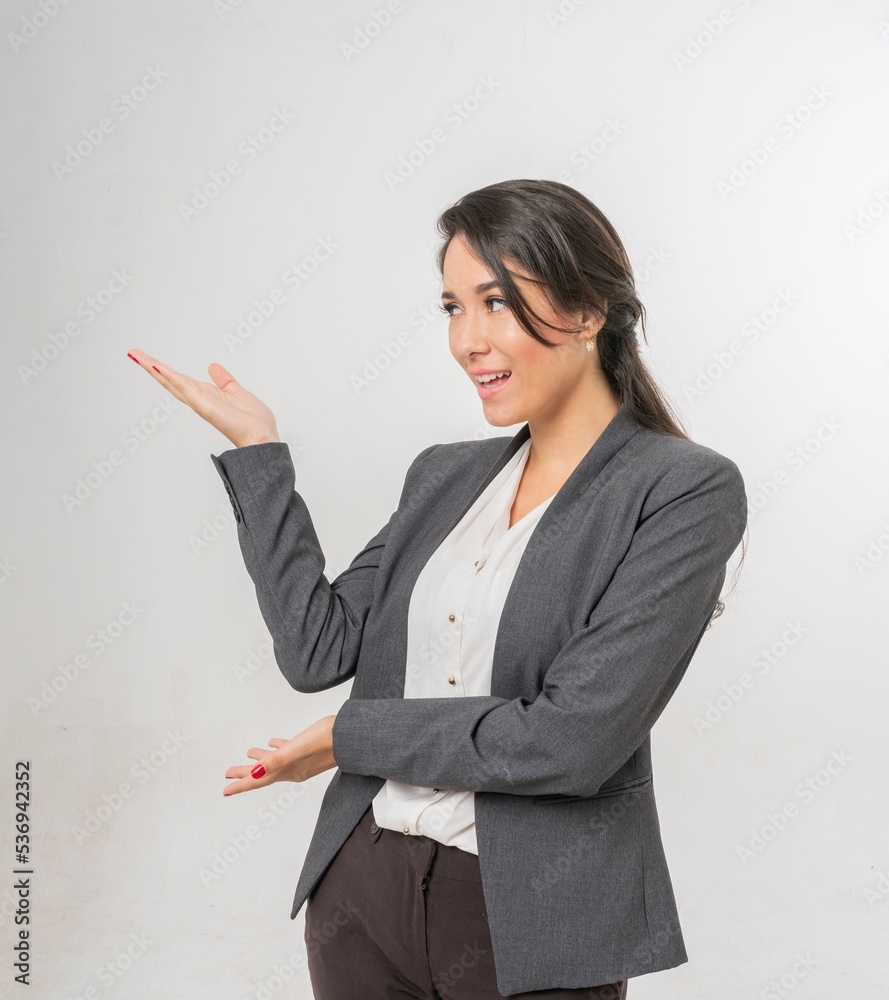 Studio portrait photo of a young beautiful elegant Brazilian female businesswoman lady wearing smart casual business attire suit posing with a series moments of emotion and gesture for all application Studio portrait photo of a young beautiful elegant Brazilian female businesswoman lady wearing smart casual business attire suit posing with a series moments of emotion and gesture for all application