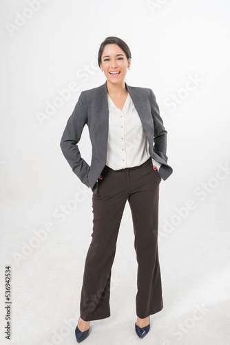 Studio portrait photo of a young beautiful elegant Brazilian female businesswoman lady wearing smart casual business attire suit posing with a series moments of emotion and gesture for all application