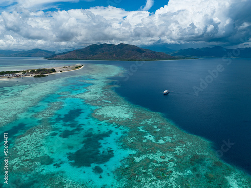 A healthy coral reef thrives off the Pulau Besar north of Flores, Indonesia. This exotic region is known for its high marine biodiversity and spectacular scuba diving and snorkeling.