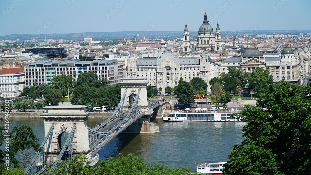 chain bridge and the cathedral of Budapest from a hilltop