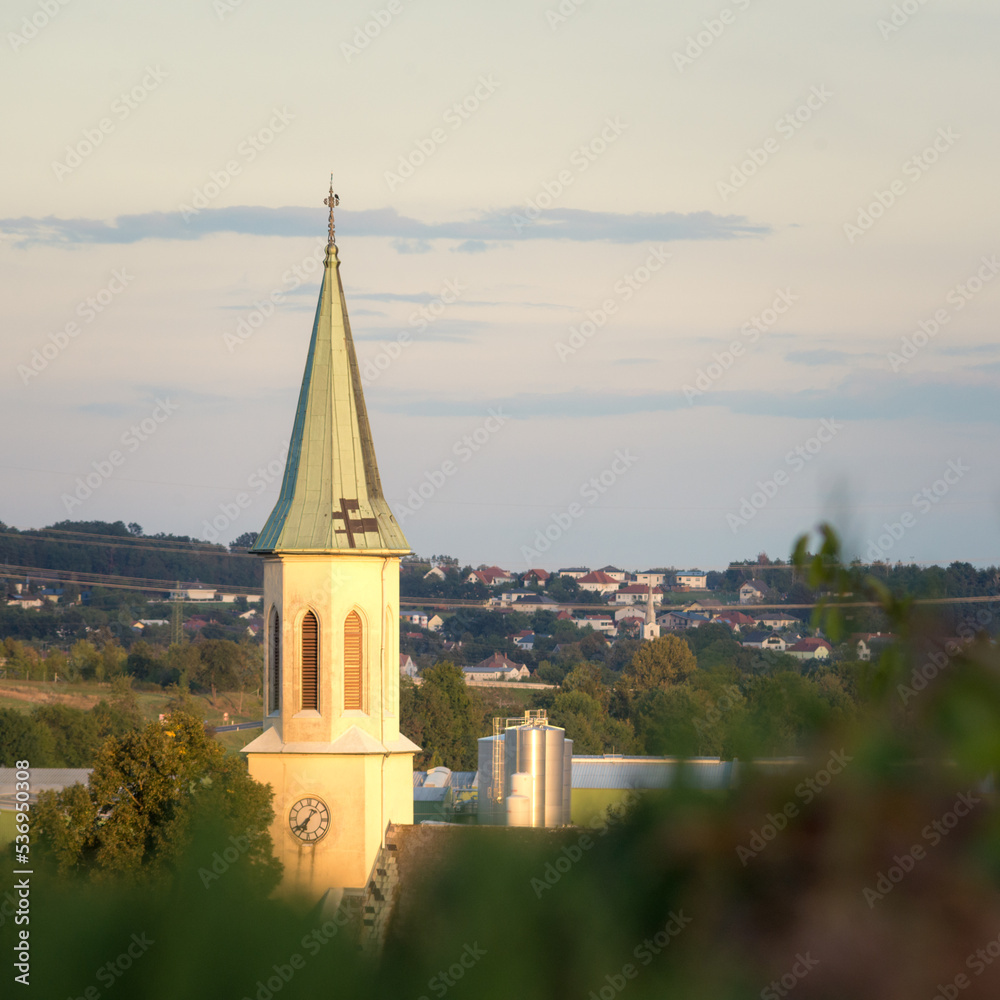  white belltower of a church in Burgenland