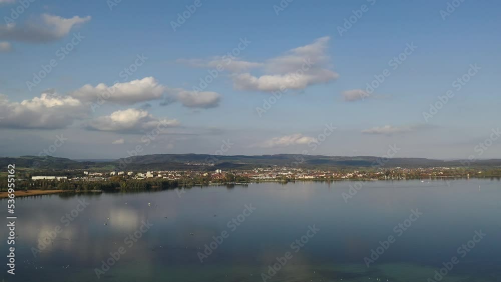 Aerial view of the lake in the region of southwestern Lake of Constance near the town of Radolfzell on Untersee with farmlands, villages and lake in late summer, Baden Wuerttemberg Aerial view of the lake in the region of southwestern Lake of Constance near the town of Radolfzell on Untersee with farmlands, villages and lake in late summer, Baden Wuerttemberg